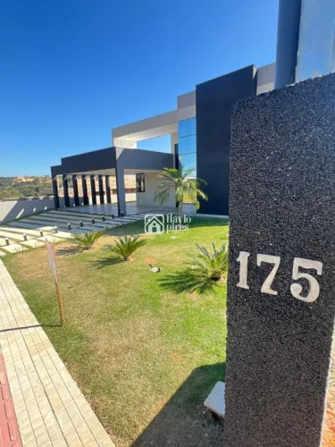 CASA EM CONDOMINIO FECHADO COM 04 QUARTOS