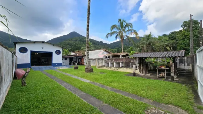 Casa com 1 dormitório e galpão à venda, 111 m² - Condomínio Verde Mar - Massaguaçu- Caragu