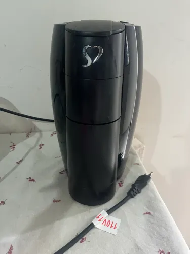 Cafeteira três corações cápsula ?