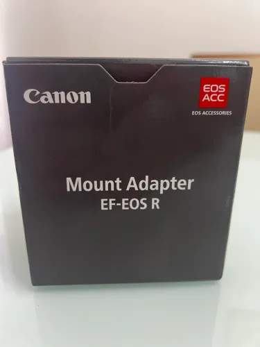 Vendo adaptador de lentes cânon  novo.