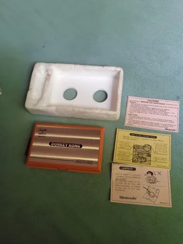 Game & Watch Nintendo anos 80 Donkey Kong conservado funcionando veja leia 