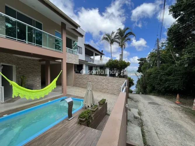 Casa com 2 dormitórios para alugar, 146m² - Lagoa da Conceição - Florianópolis/SC