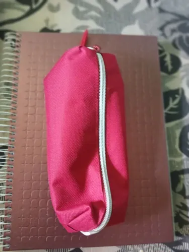 Bolsa,bolsinha e caderno