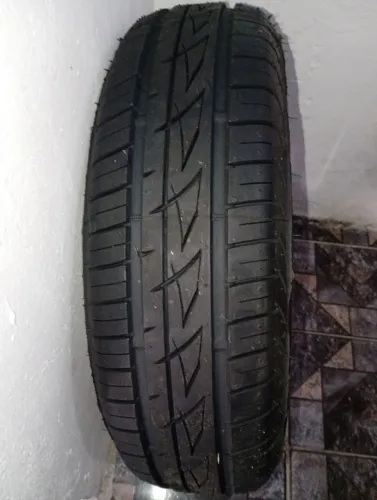 Vendo pneu Firestone aro 14 175/65 novo valor 750 