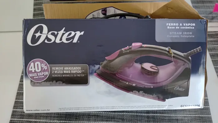 Ferro de passar roupa a vapor