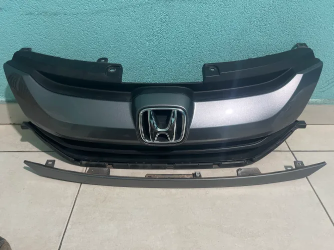 Grade frontal e friso traseiro city