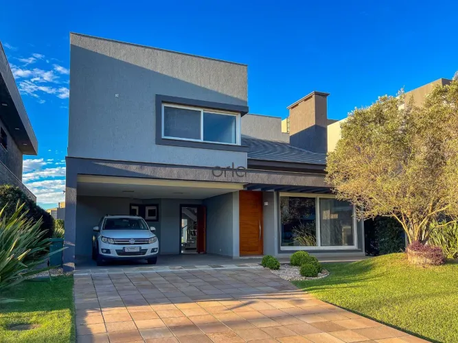 Casa beira lago semi mobiliada com 4 suítes e piscina no Condomínio Enseada, Xangri-Lá REF