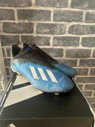 Chuteira Adidas X