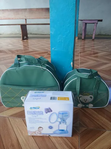 Bolsas de Neném e Bomba de tirar leite.