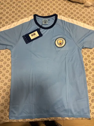 Camisa Manchester City The Blues Juvenil Azul