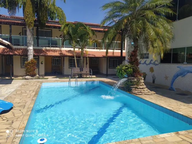 Flat com Piscina em pousada