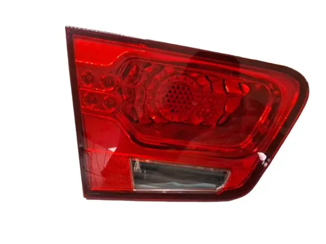 Lanterna tampa Cerato 09/12 l.e 