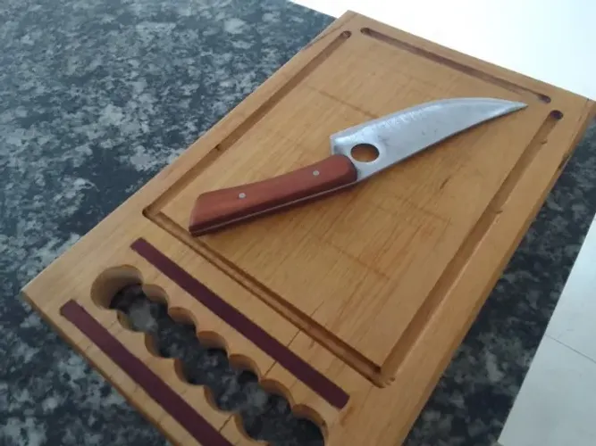 Tábuas de carne e facas