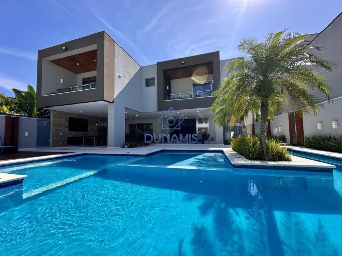 Belíssima Casa à venda no Guarujá - Condomínio Jardim Acapulco.