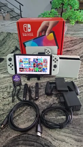 NINTENDO SWITCH OLED BRANCO DESBLOQUEADO NA CAIXA COM 21 JOGOS