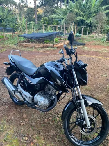 Moto impecável