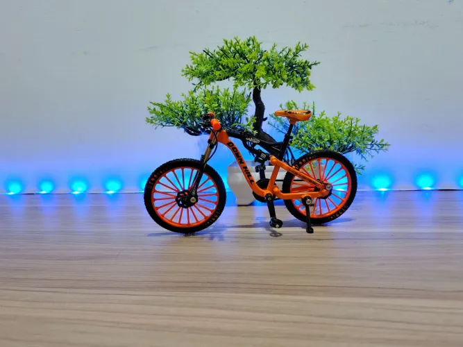 Bicicleta miniatura colecionável em ferro toda funcional cor preto e laranja 