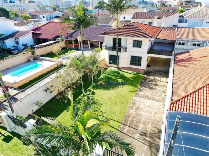 Sobrado com 5 dormitórios à venda, 338 m² por R$ 1.200.000,00 - Centro - Guaratuba/PR