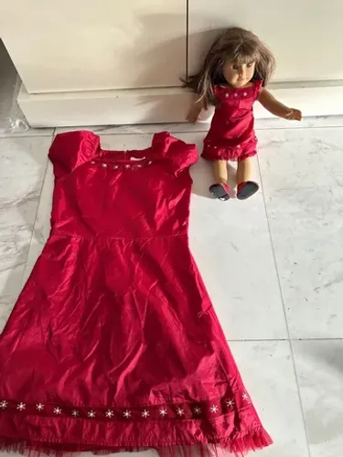 boneca american girl com roupa para criança combinando