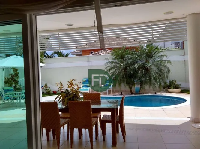Casa com 3 dormitórios à venda, 469 m² por R$ 4.100.000,00 - Condominio Flora Frezzarin -