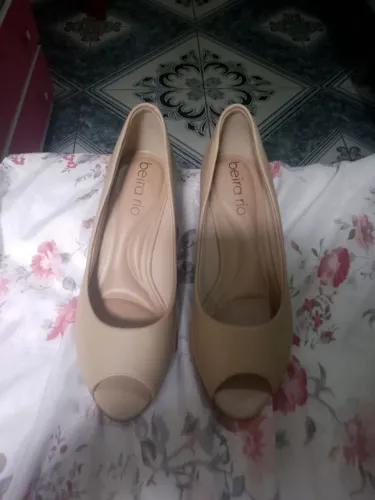 Sapatos Scarpan e salto ato