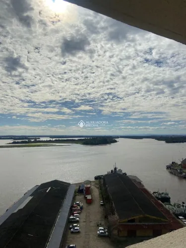 Sala comercial com vista para o Guaíba.
