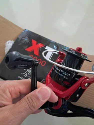 Molinete de pesca xt 6000 novo