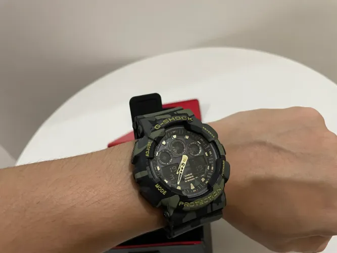 Relógio Casio G-Shock GA-100 Camuflado Verde e Dourado