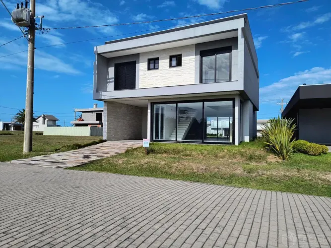 Casa Condomínio à venda em Capão da Canoa - Arenas Curumim REF: 4558