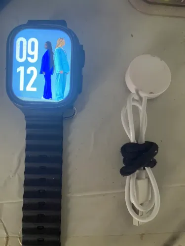Relógio smart usado com pulseiras e carregador de indução