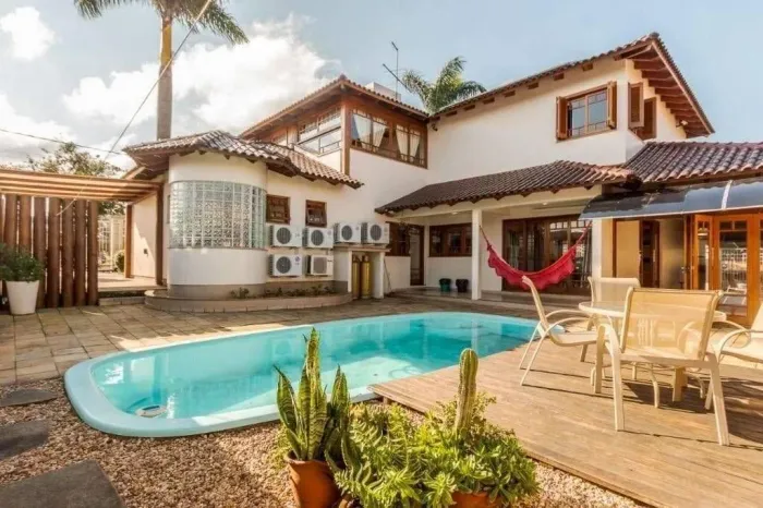 Sobrado com 4 dormitórios para alugar, 427 m² por R$ 12.550,00/mês - Centro - Gravataí/RS