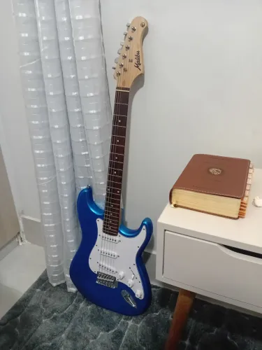 Guitarra com capa está perfeita
