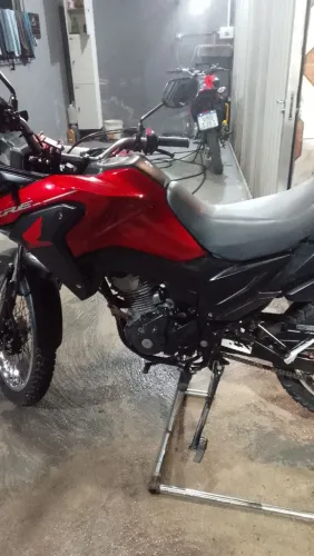 (*A moto está linda nova nova )