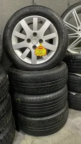 RODA 15 SEMI NOVA PEUGEOT COM PNEUS 195/60R15