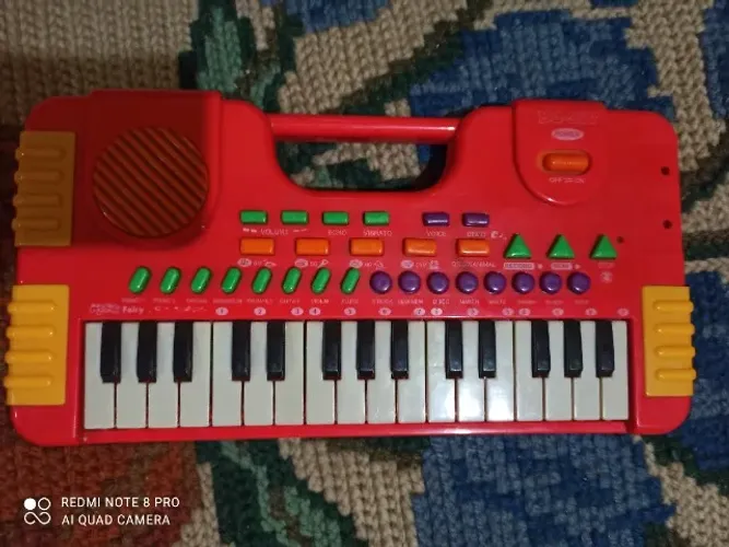Brinquedo teclado musical