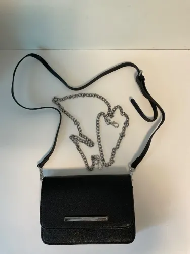Bolsa preta de sair