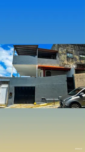Casa com varandão e garagem