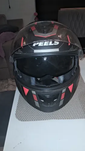 Capacete escamoteável