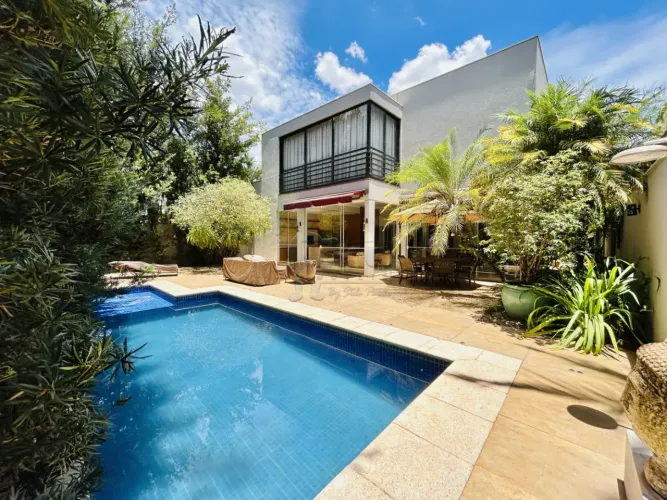 Casa sobrado mobiliado de 384m² com 04 suítes à venda em condomínio - Guaporé