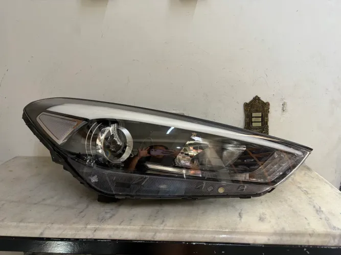 Farol new Tucson 2017/2022 original lado direito sem recuperação 