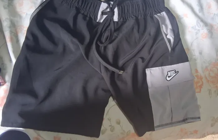 Short nike estilo cargo bolso do lado