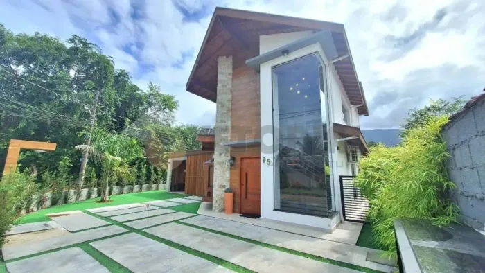 Sobrado com 3 dormitórios à venda, 220 m² por R$ 2.200.000,00 - Massaguaçu - Caraguatatuba