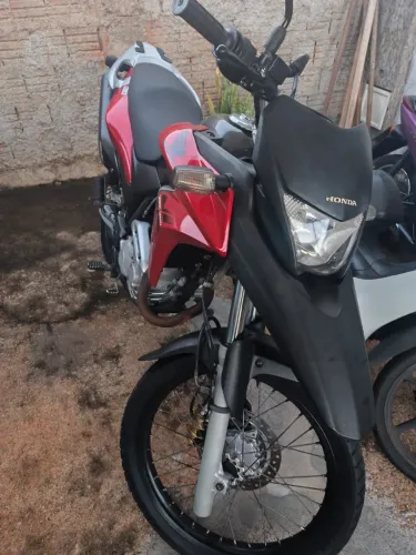XRE 300 Valor de 18.500 E BIZ 100 ES Valor de 11.500