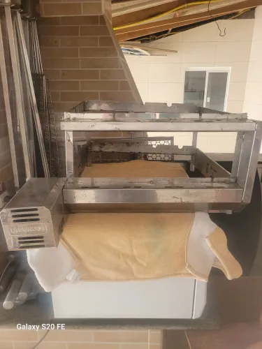 Churrasqueira giratória inox com 7 espetos