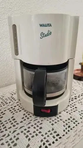 Cafeteira antiguinha mas funciona perfeitamente e rápida