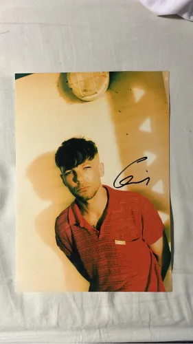Autógrafo Louis Tomlinson 