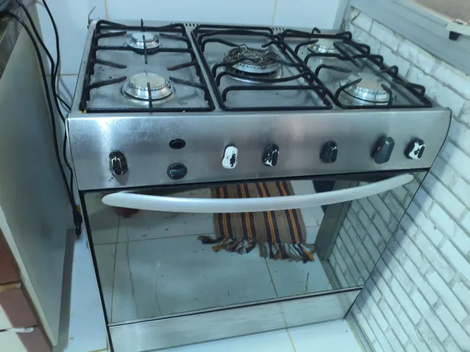 Doação Fogão em mau estado, funcionando
