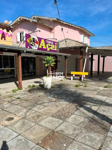 Prédio Comercial e Residencial em Atlântida Sul