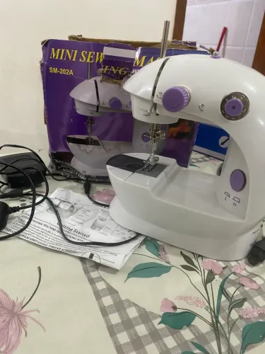 Máquina costura portátil valor 35$ nova
