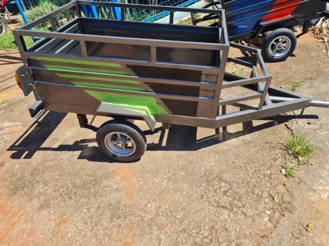 "Carretinha pra puxar em moto supermercado etc fechos de molas pra até 300kg fábricamos to